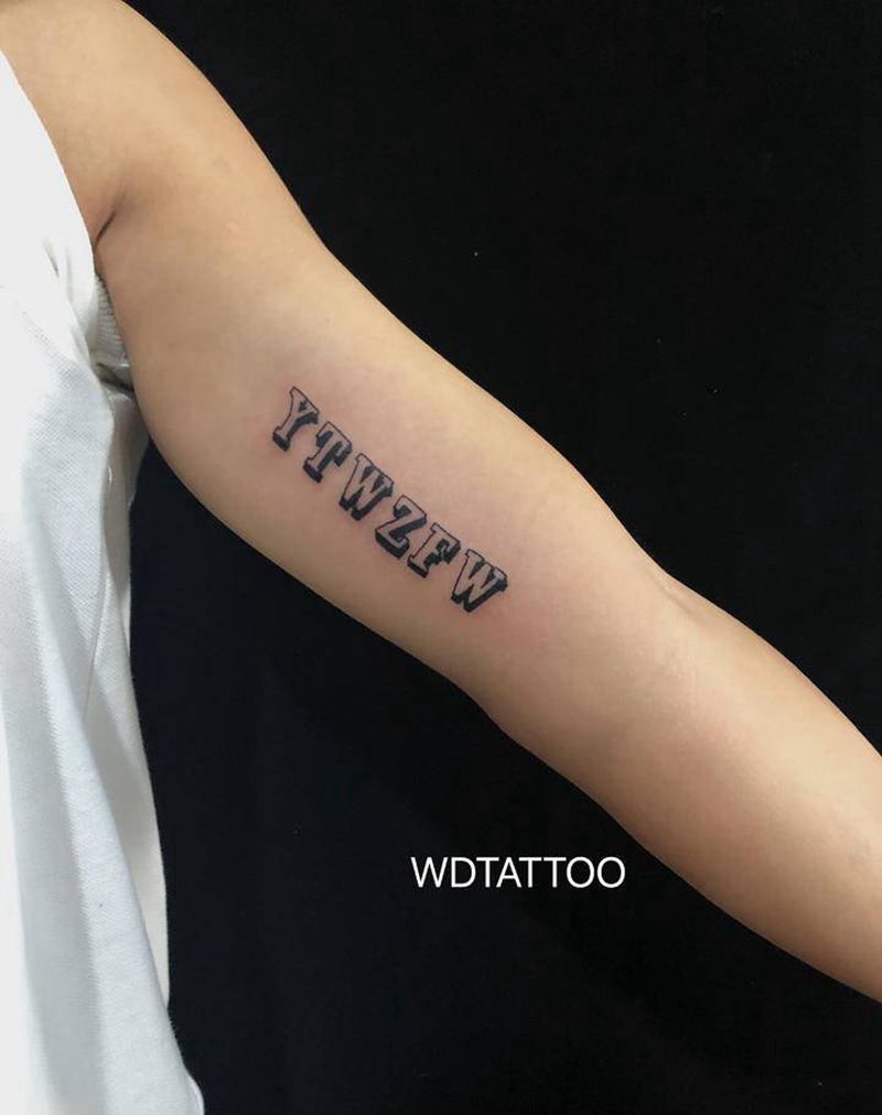 英文纹身图片_手臂花体字纹身图案