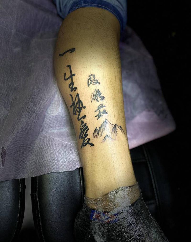 爱美女纹身图片_腿部水墨纹身图案