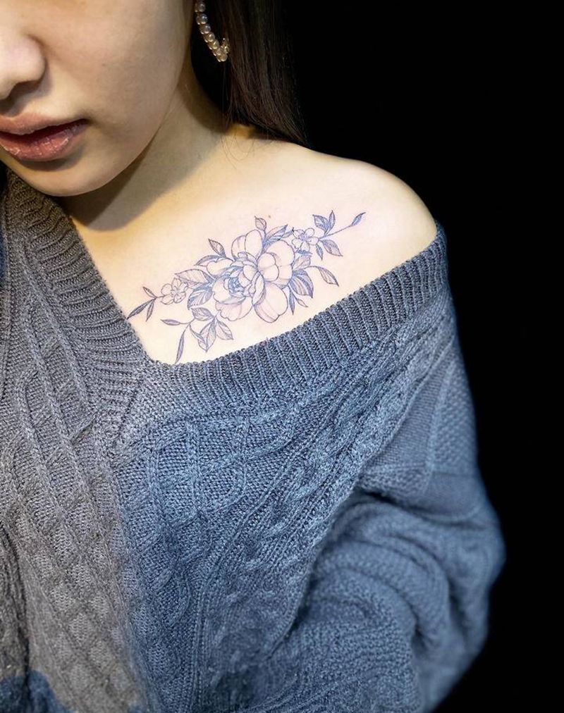 素华纹身图片_胸部点刺纹身图案