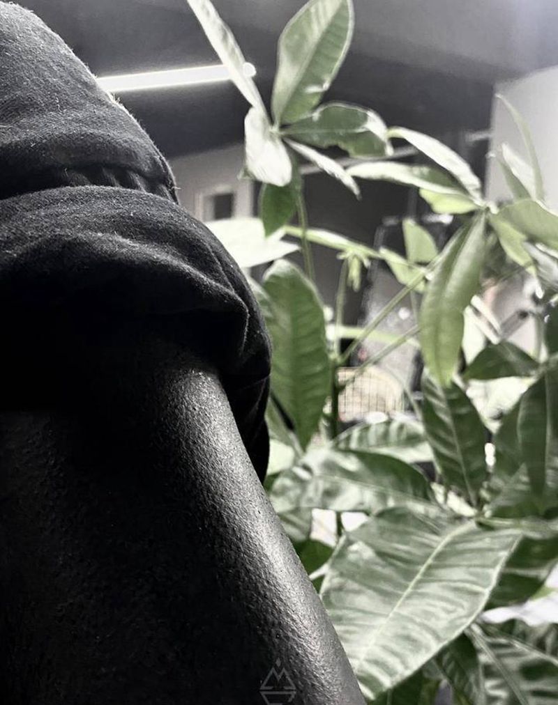 黑臂纹身图片_手臂纹身图案