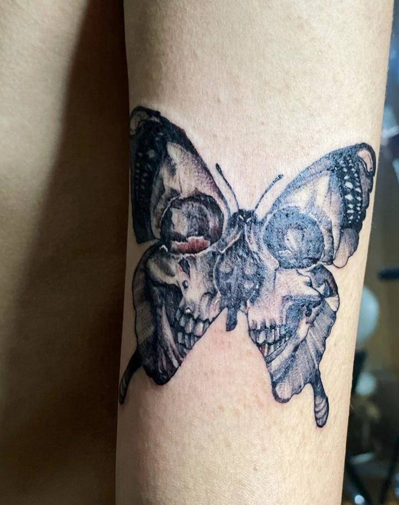 骷髅蝴蝶纹身图片_手臂纹身图案