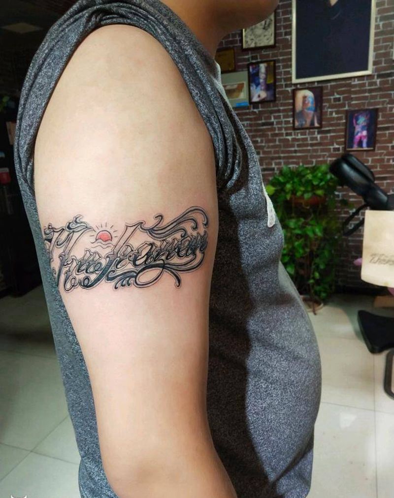 名字纹身图片_手臂花体字纹身图案