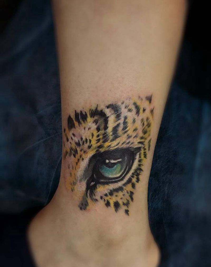 单只豹眼纹身图片
