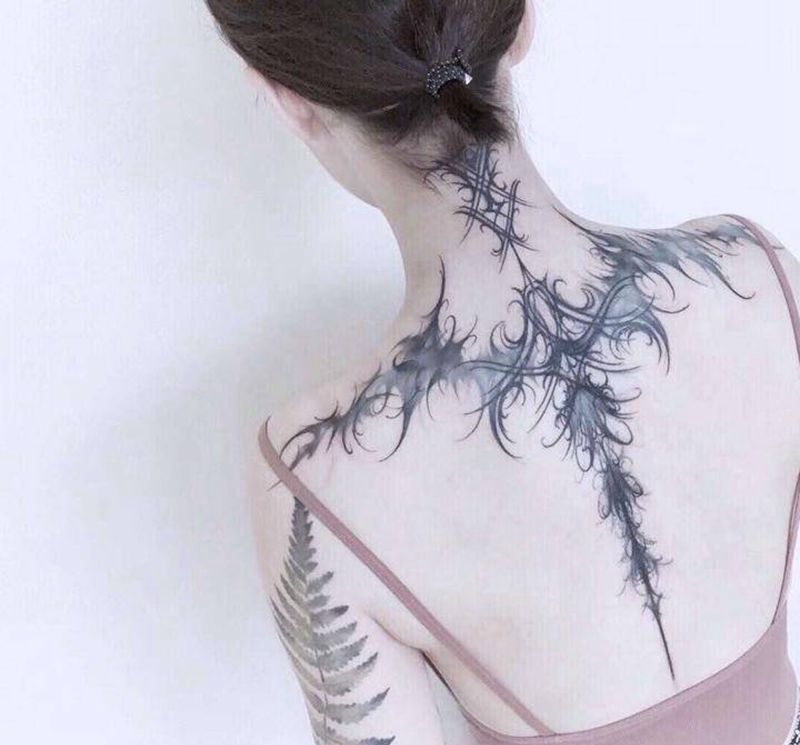 重生纹身图片_背部纹身图案