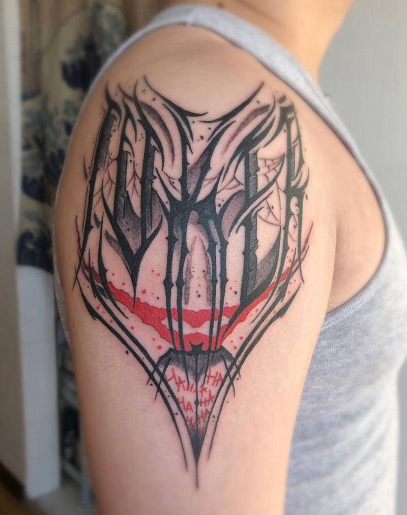 英文纹身图片_手臂花体字纹身图案