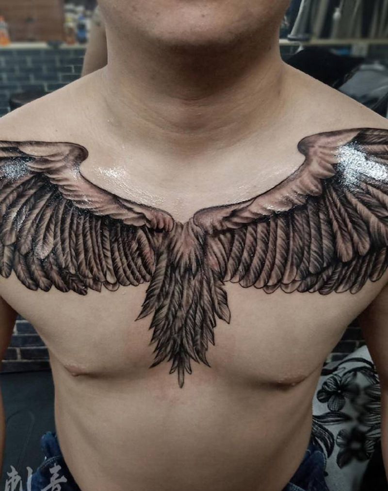 花胸翅膀纹身图片_欧美写实纹身图案