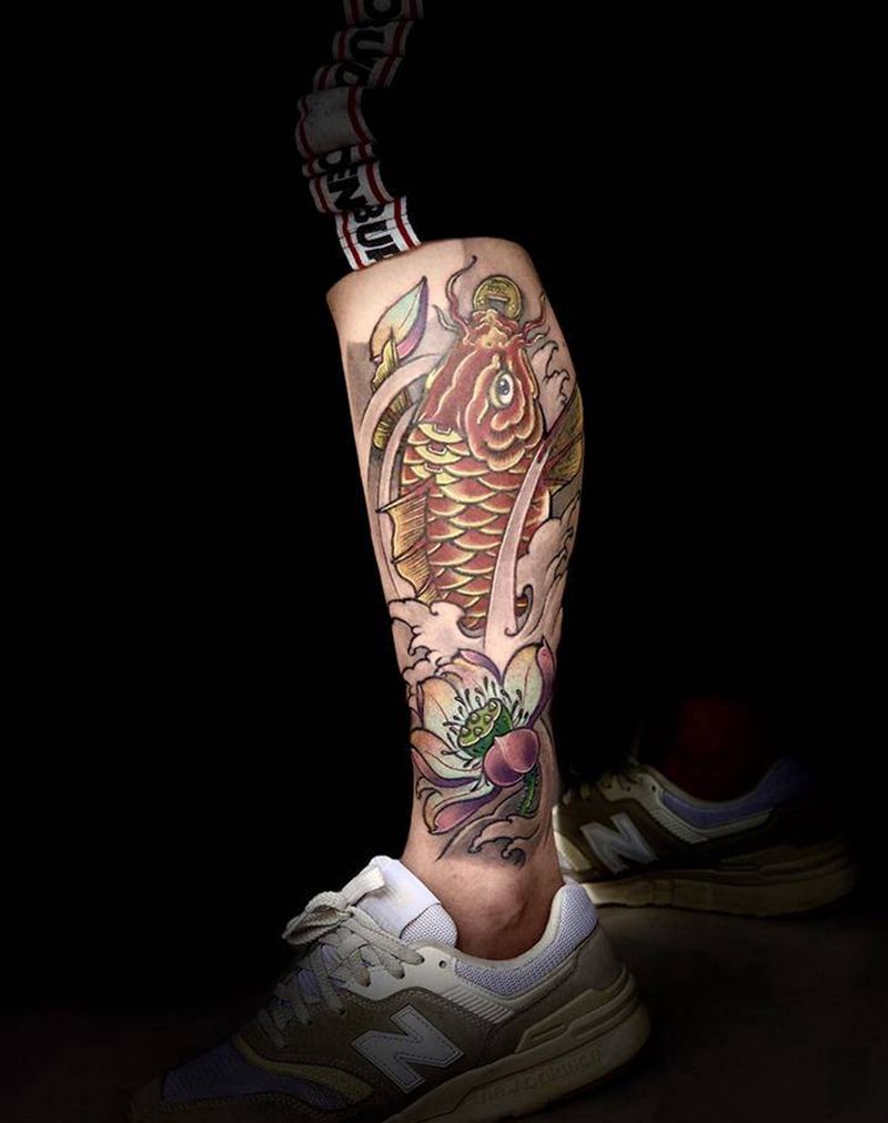 招财鱼纹身图片_腿部老传统纹身图案