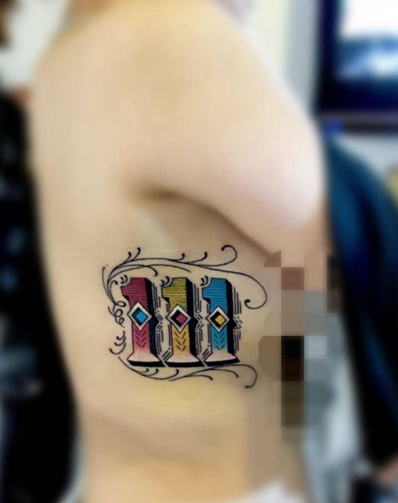 花体字纹身图片_腰部胸部花体字图腾纹身图案