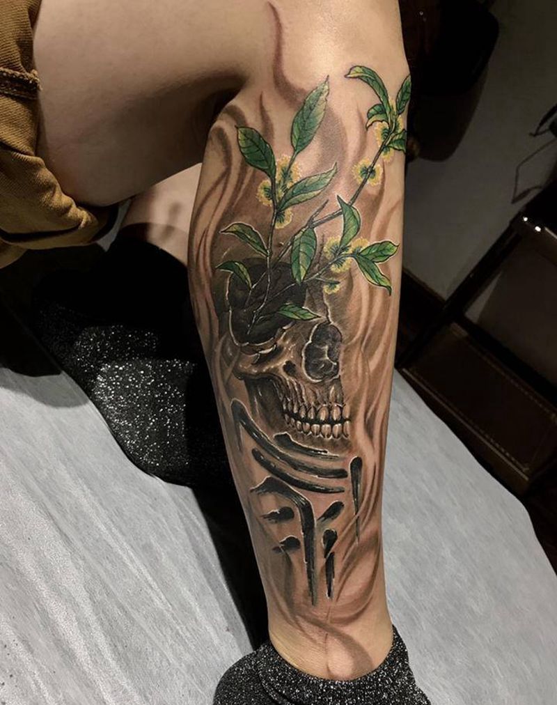 骷髅+桂花纹身图片_腿部欧美写实水墨纹身图案