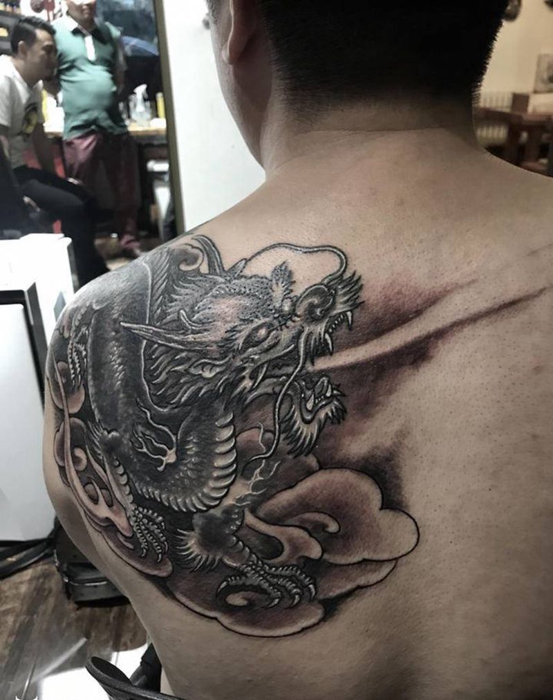 麒麟纹身图片_背部肩部老传统新传统纹身图案