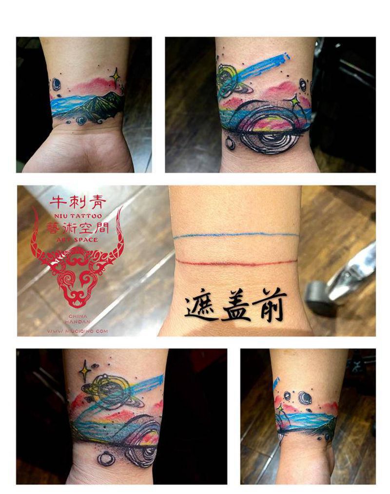 小宇宙纹身图片_手臂水彩点刺纹身图案