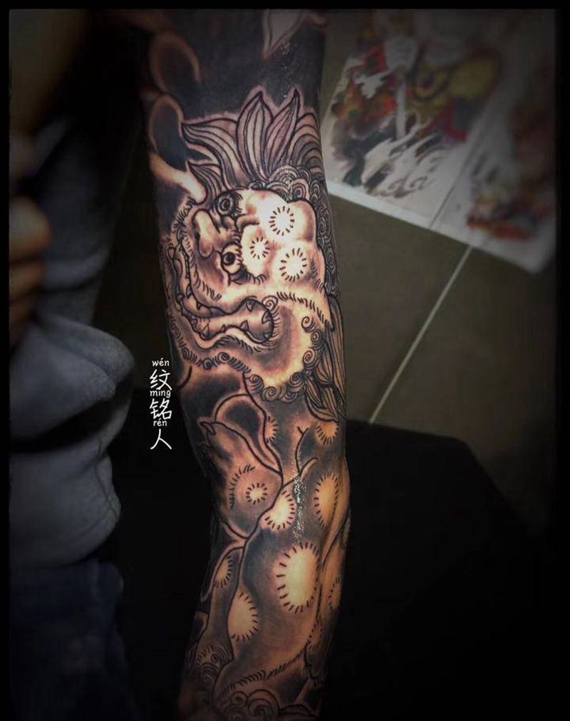 唐狮花臂全程无痛 未完待续纹身图片_手臂新传统动物纹身图案