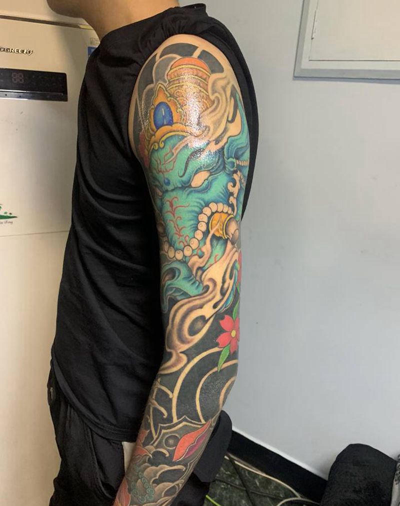 花臂未完成纹身图片_手臂新传统纹身图案