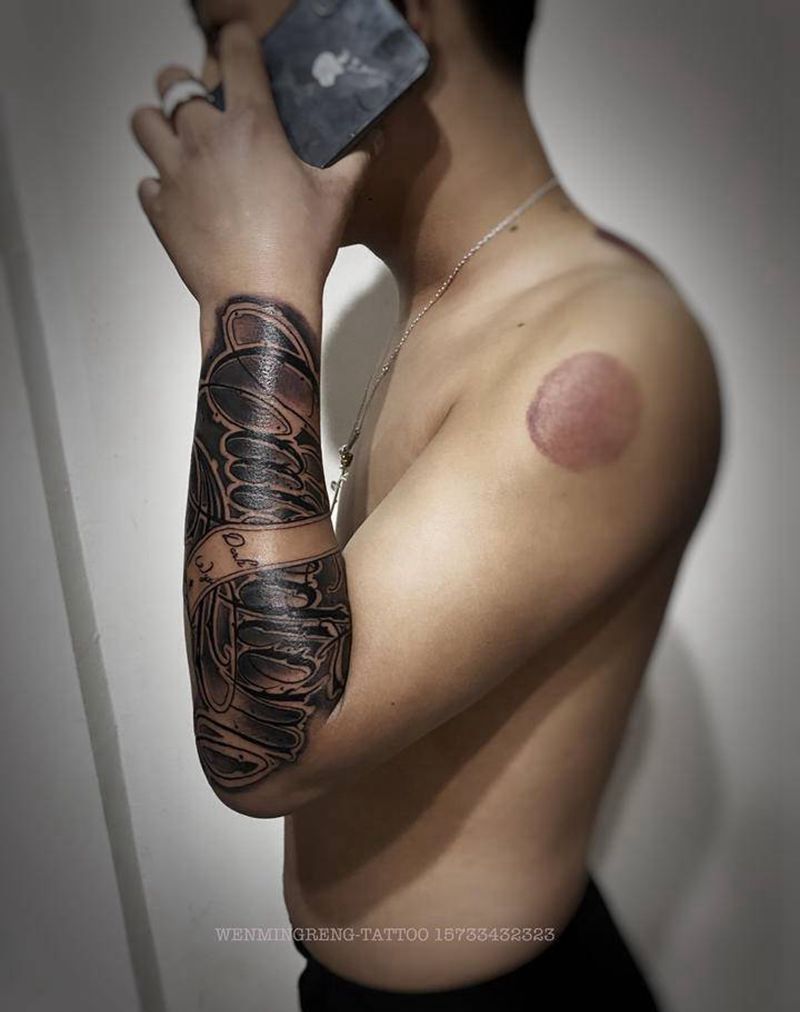 花体英文奇卡诺纹身图片_手臂新传统纹身图案