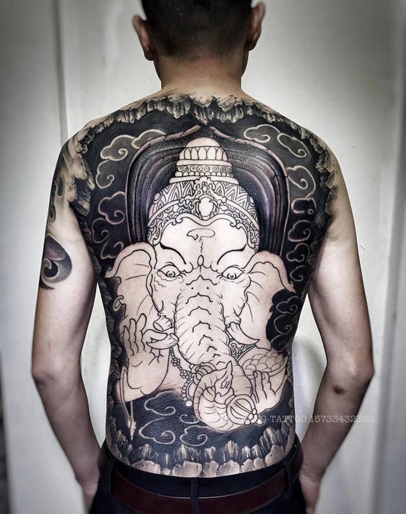 后背象神 未完待续纹身图片_背部新传统纹身图案