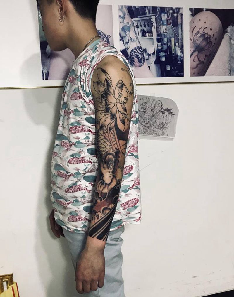 新传统花臂纹身图片_手臂新传统纹身图案