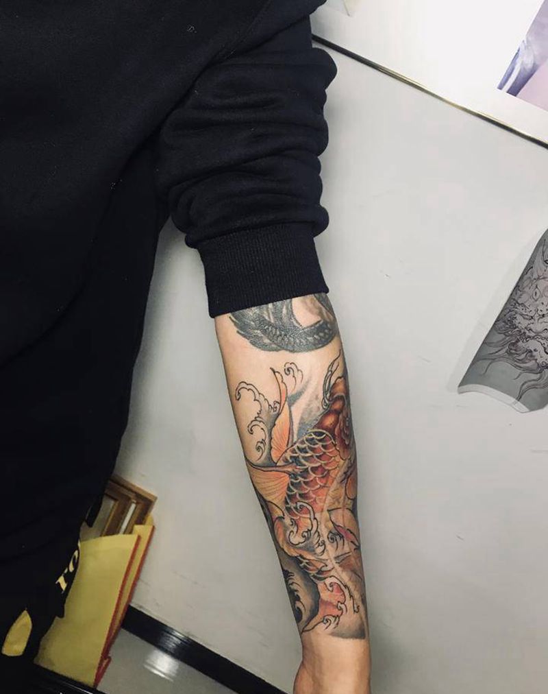 鲤鱼跃龙门纹身图片_手臂纹身图案