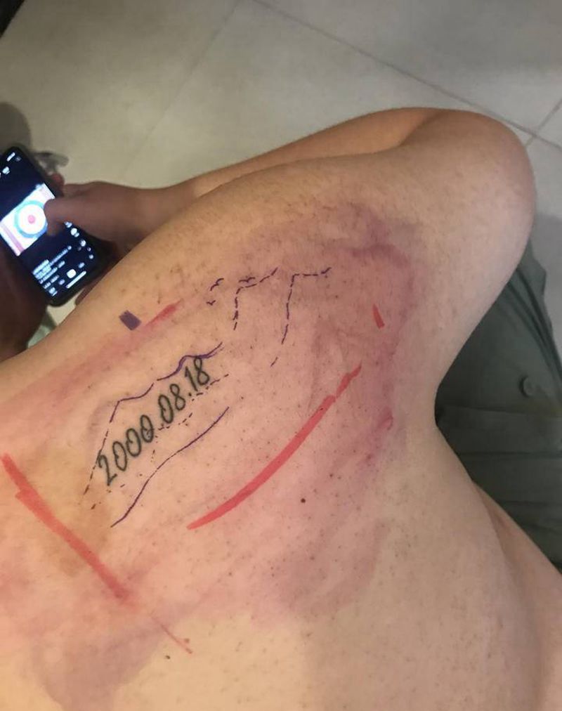 遮盖 小山峰纹身图片_背部纹身图案