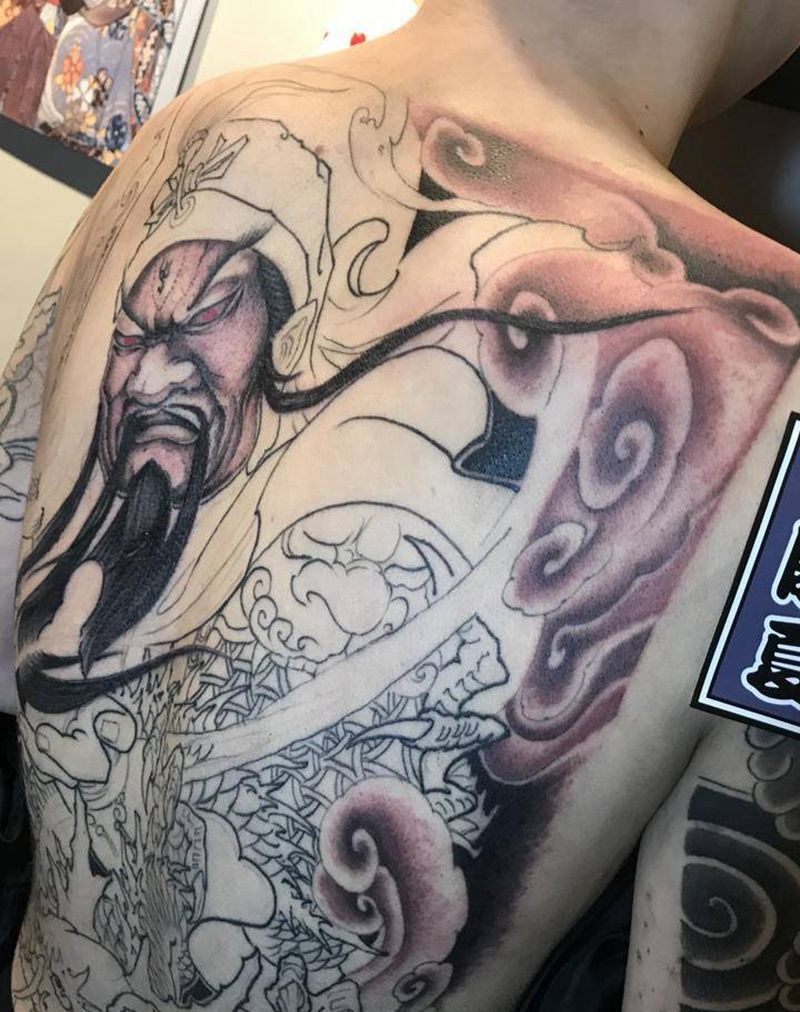 关公踏龙纹身图片_背部新传统纹身图案