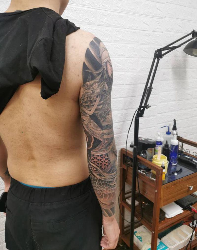 花臂纹身图片_手臂老传统纹身图案