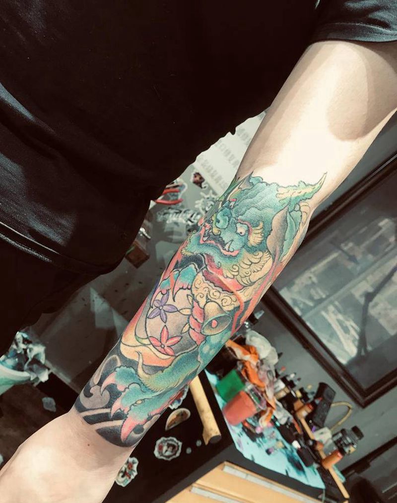 唐狮遮盖纹身图片_手臂新传统水彩纹身图案