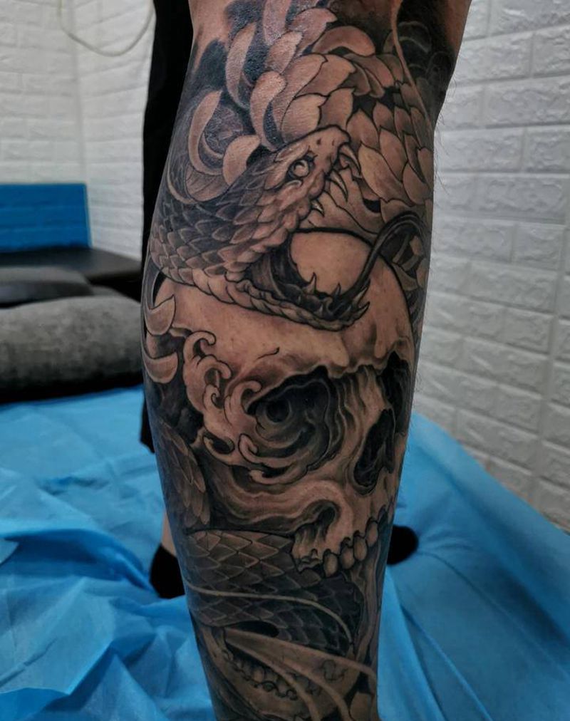 象神(抱小腿)纹身图片_腿部老传统纹身图案