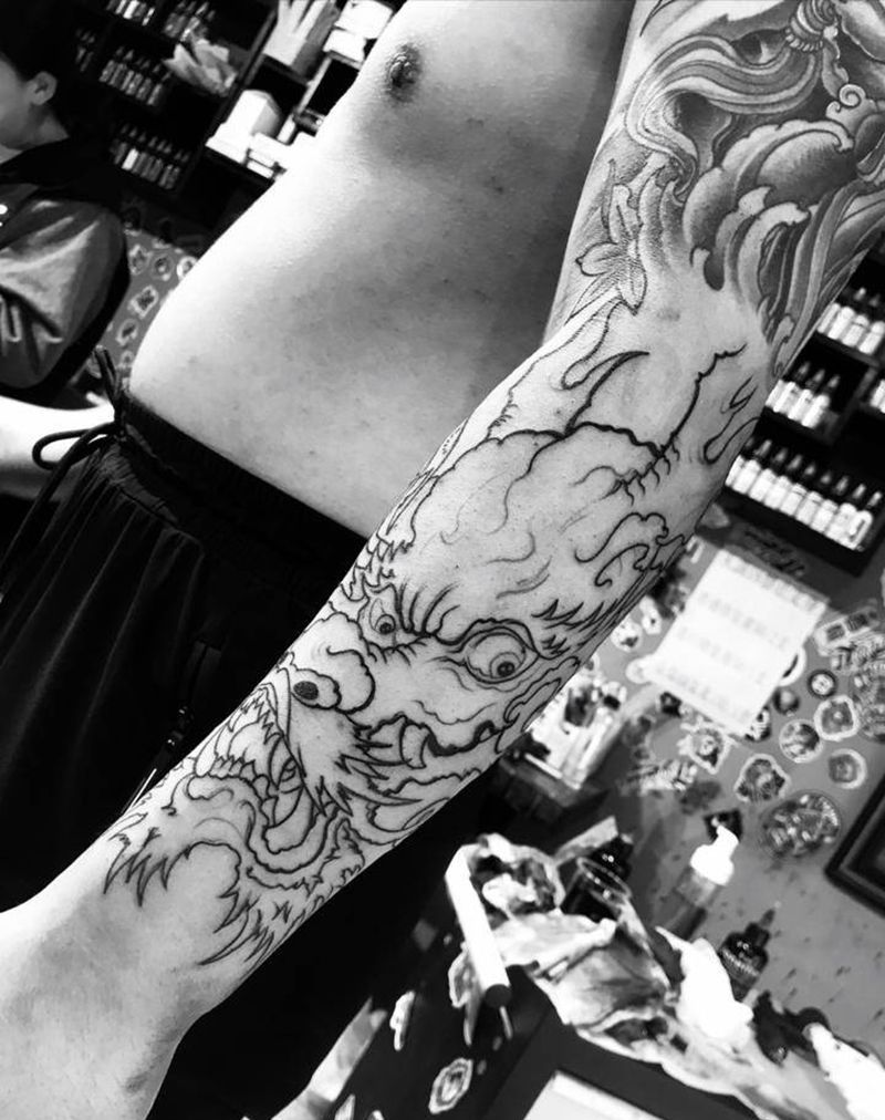 花臂龙纹身图片_手臂肩部新传统老传统纹身图案