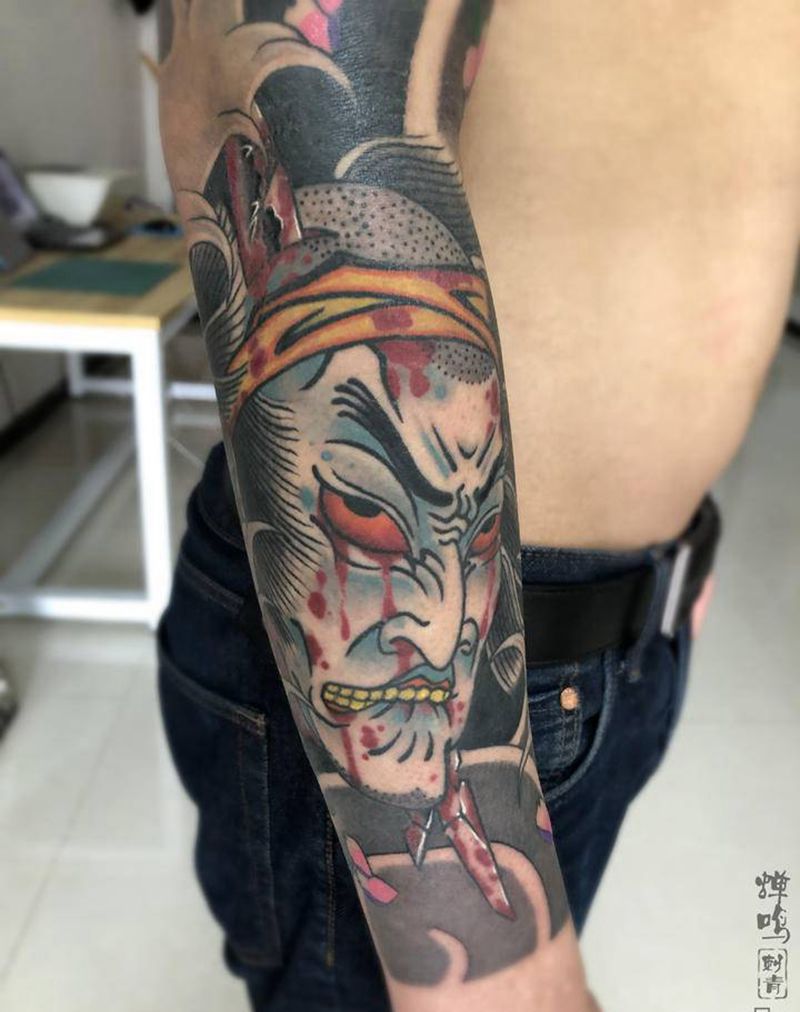 生首和面具纹身图片_手臂老传统纹身图案