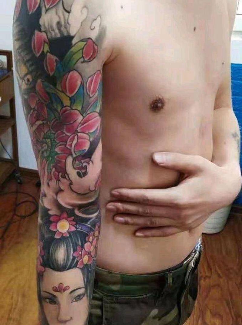 花臂纹身图片_手臂老传统新传统纹身图案