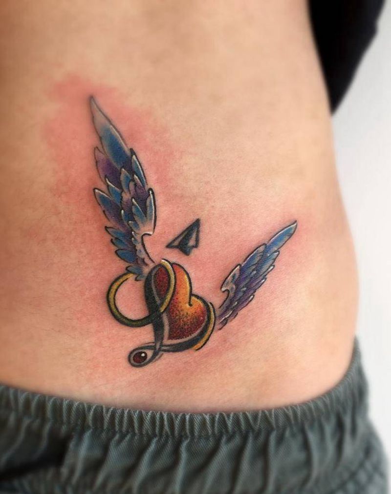 放飞自我？？？纹身图片_腹部New School纹身图案