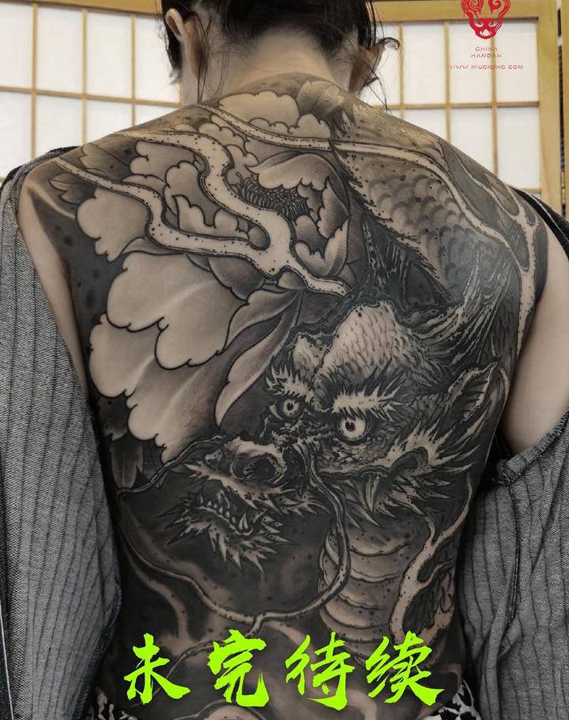 未完待续纹身图片_背部新传统水墨纹身图案