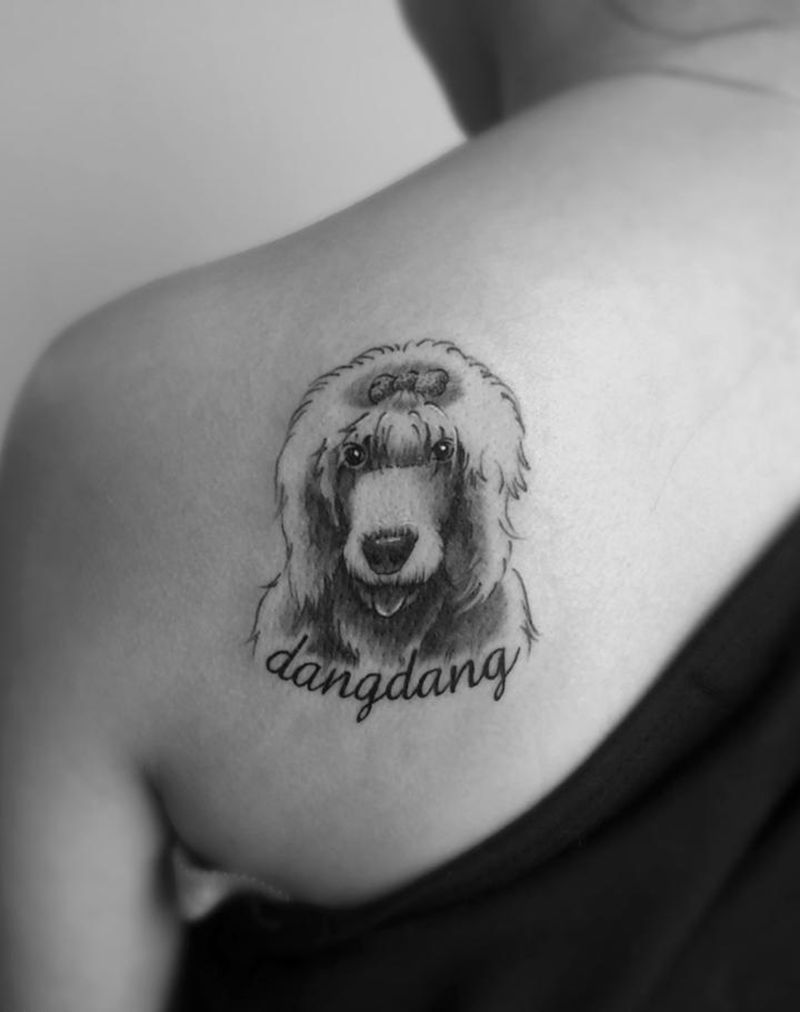 古牧纹身图片_成品背部清新动物原创纹身图案