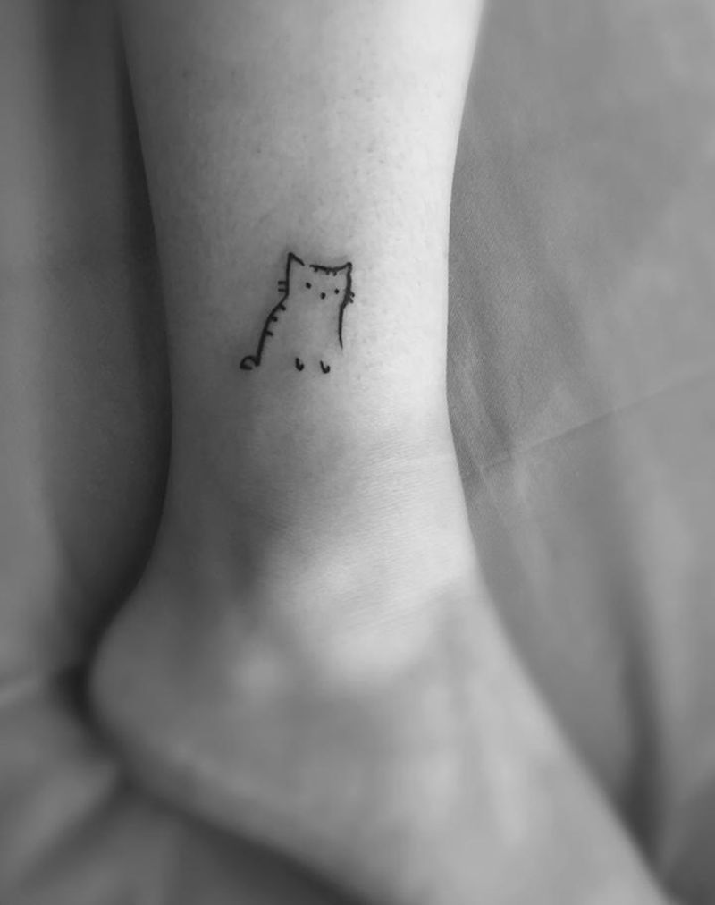 小喵咪纹身图片_成品腿部清新动物图腾纹身图案