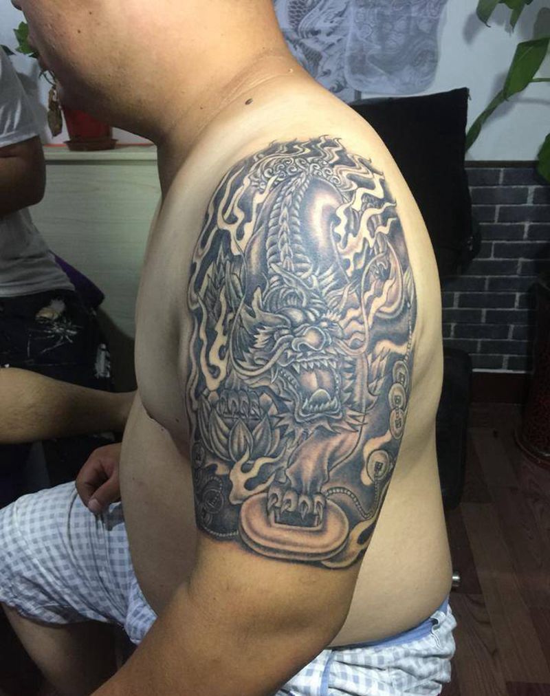 麒麟纹身图片_传统纹身图案