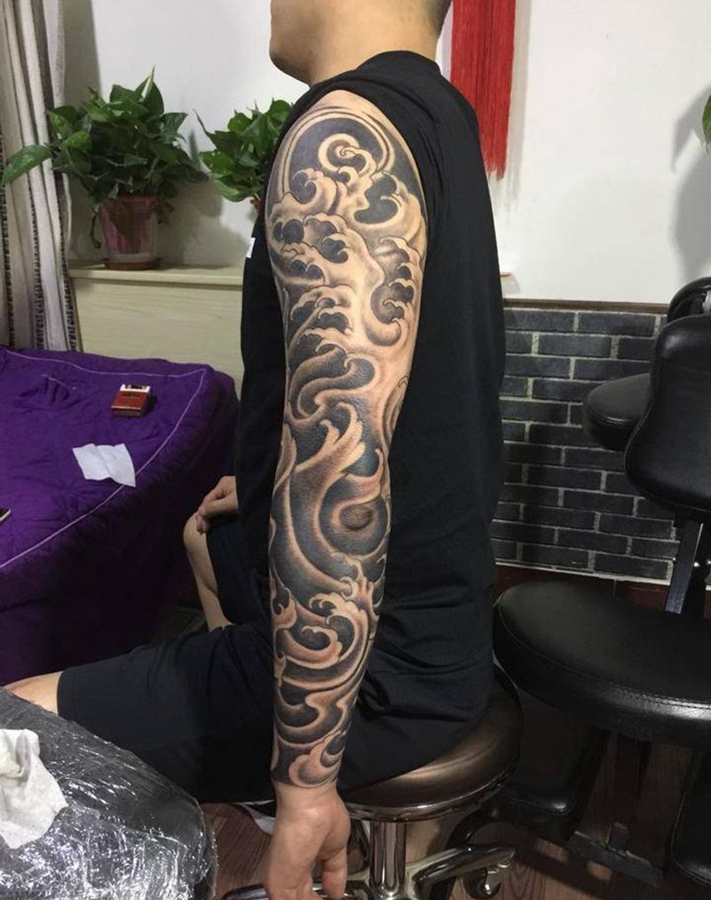 海浪花臂纹身图片