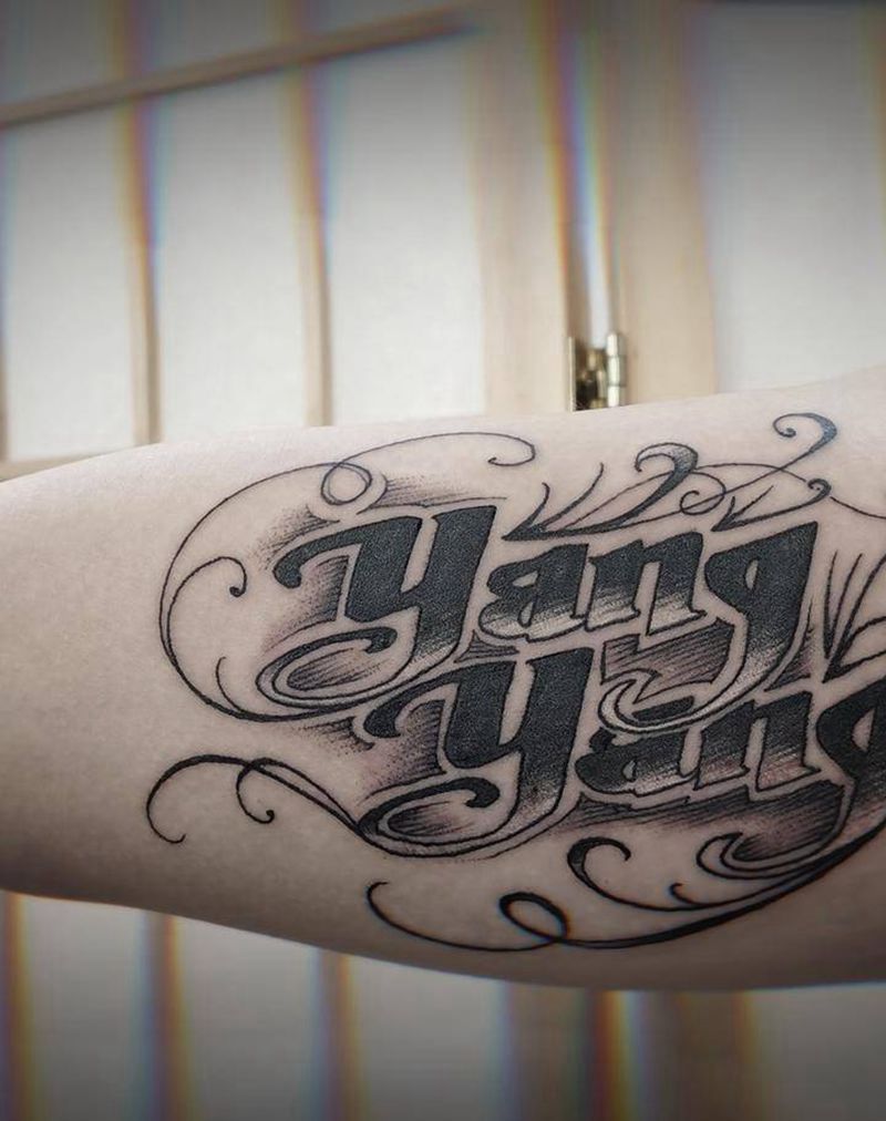 花体字纹身图片_手臂花体字纹身图案