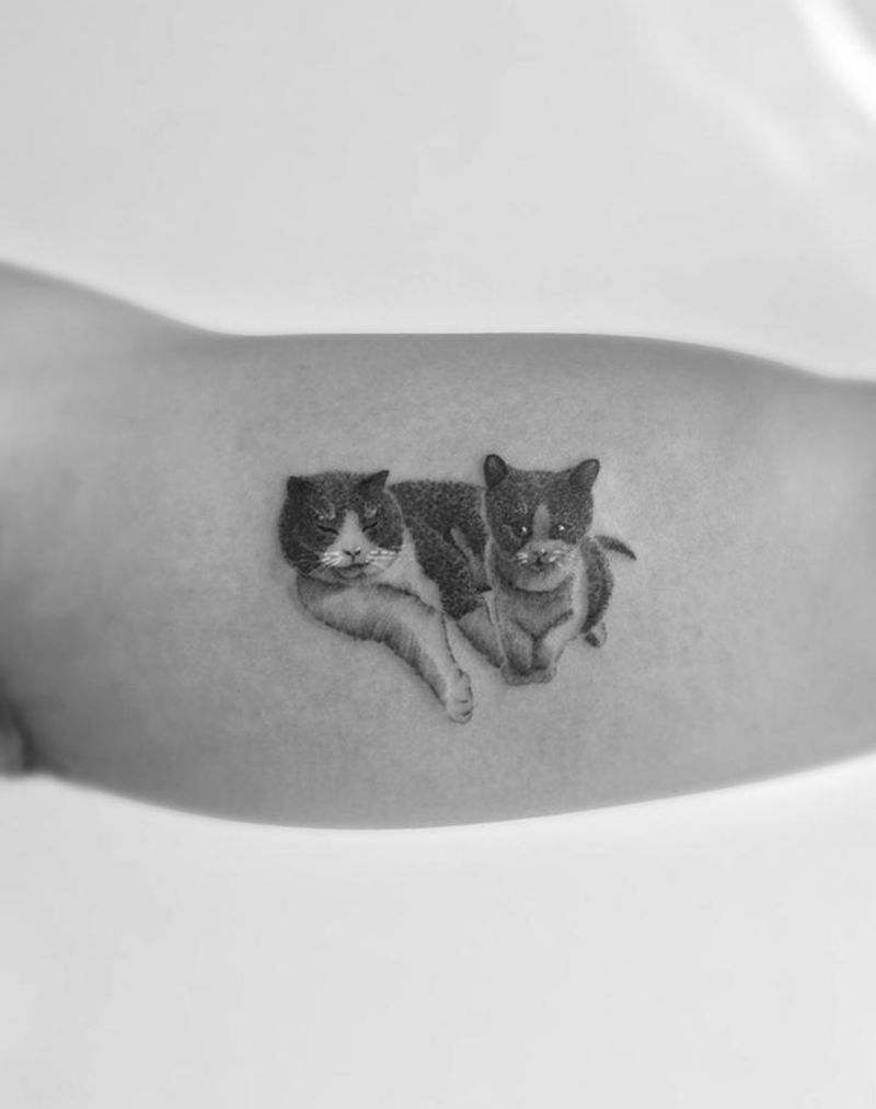 喵星人纹身图片_手臂New School纹身图案