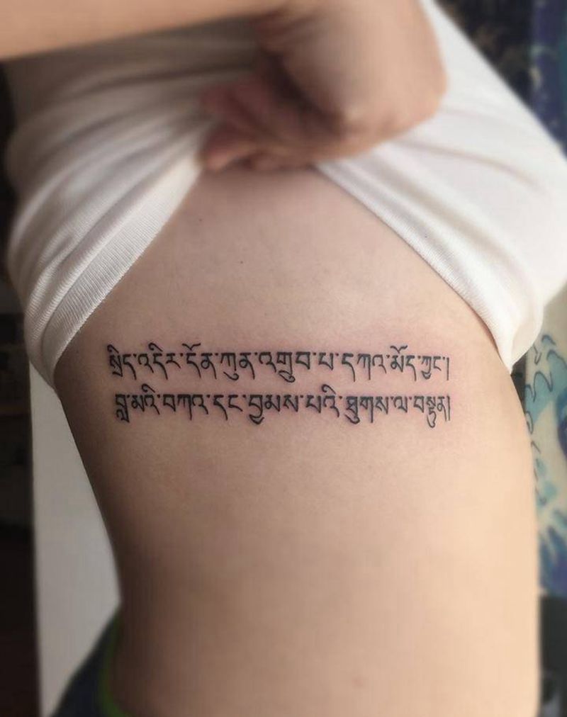 藏文纹身图片_腰部图腾纹身图案