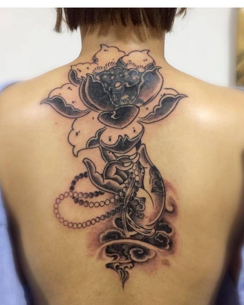 佛指拈花纹身图片_成品背部传统植物静物原创纹身图案