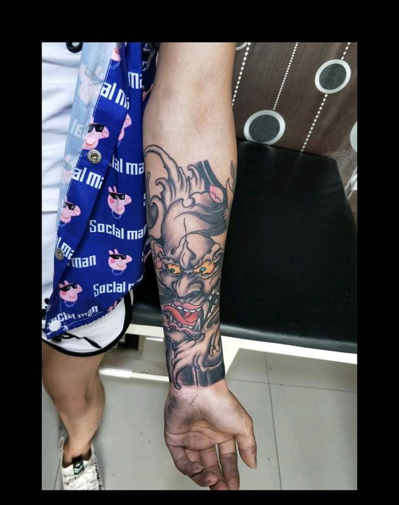 包小臂遮盖纹身图片