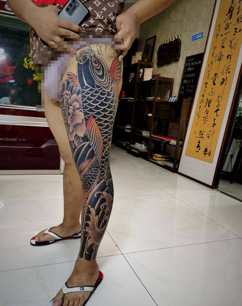 花腿鱼纹身图片_腿部老传统纹身图案