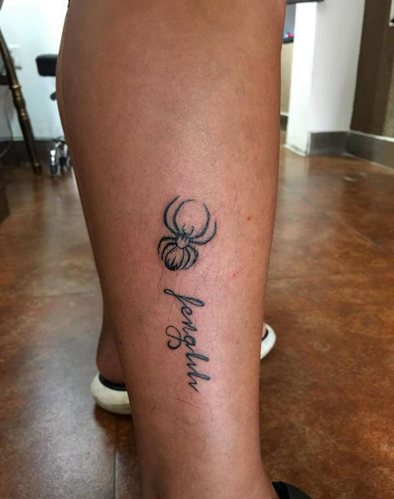 花体英文纹身图片_腿部花体字纹身图案