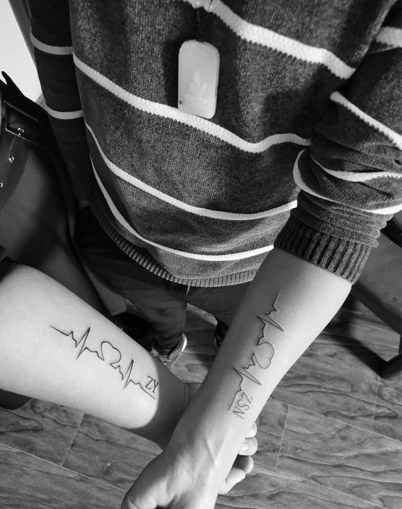 情侣纹身图片_手臂老传统纹身图案