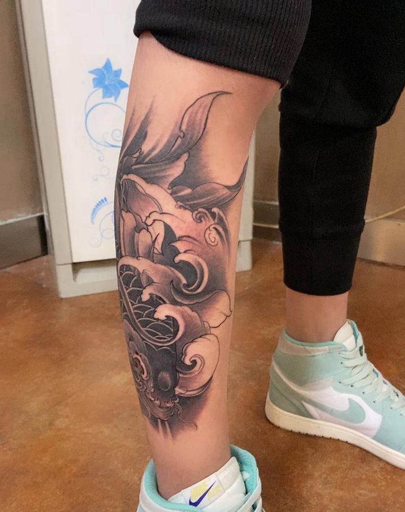 鱼纹身图片_腿部纹身图案