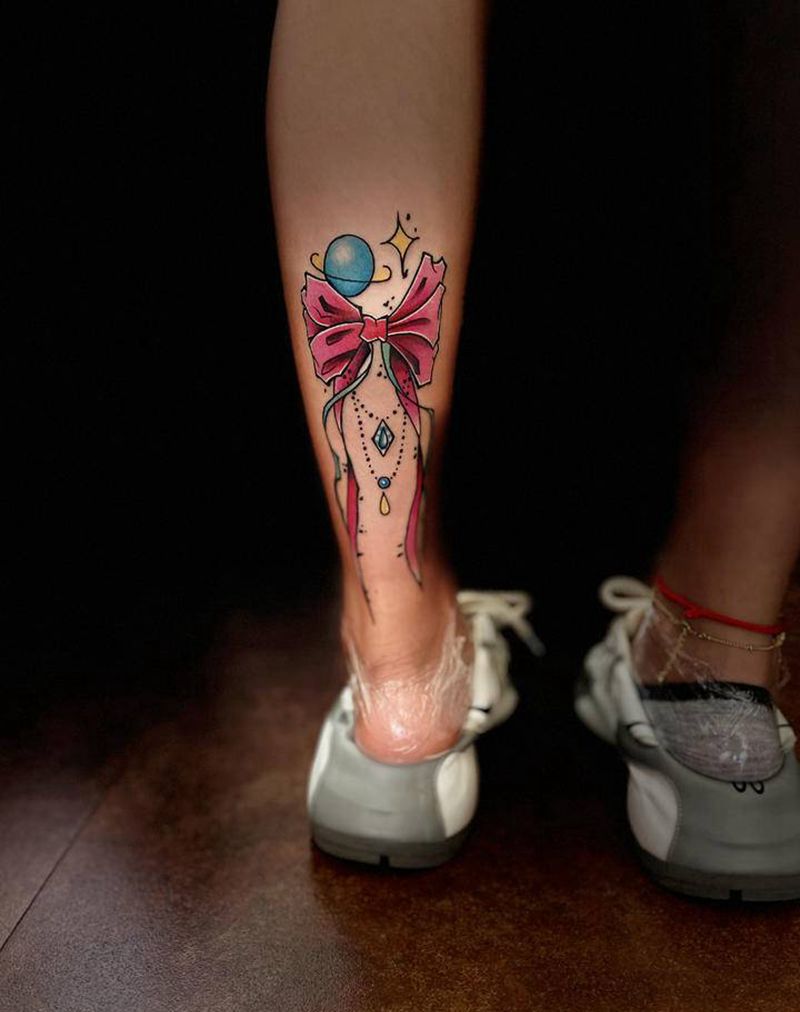 蝴蝶结纹身图片_腿部水彩纹身图案