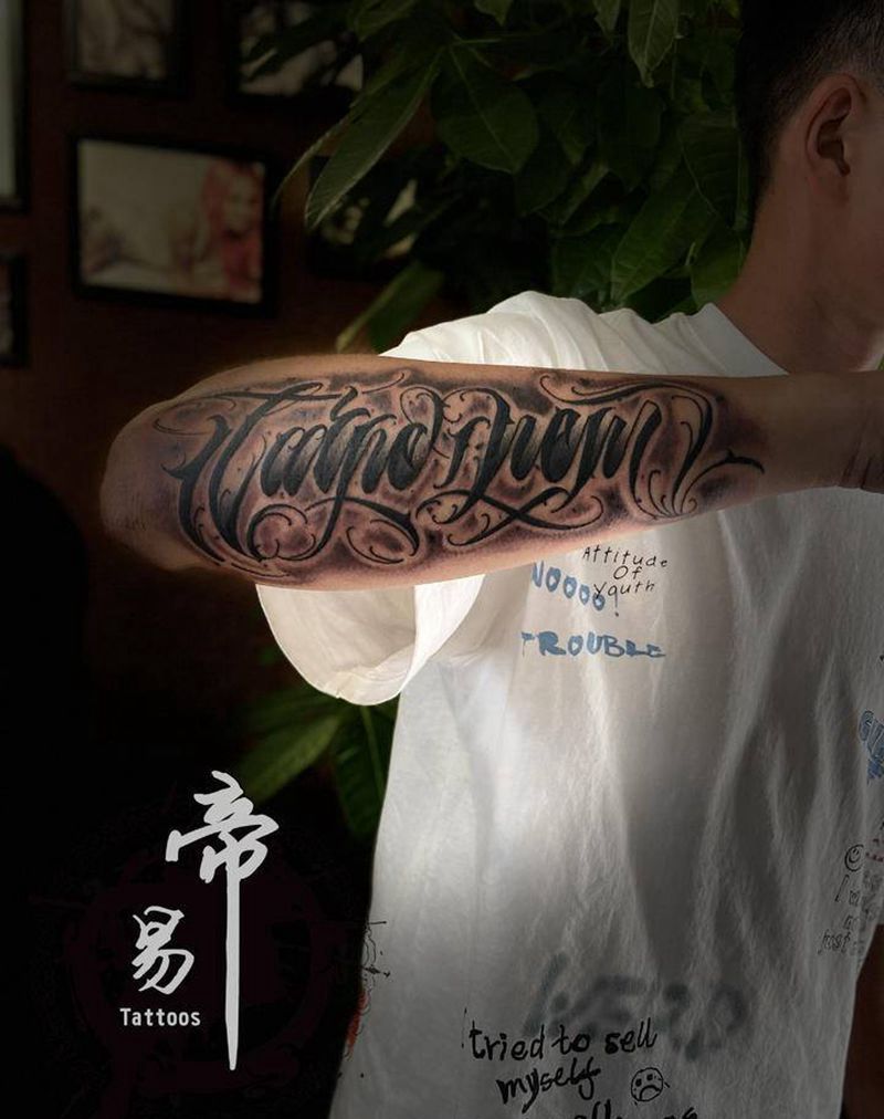 花体字纹身图片_手臂花体字纹身图案