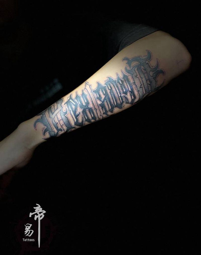 屠夫纹身图片_手臂花体字纹身图案