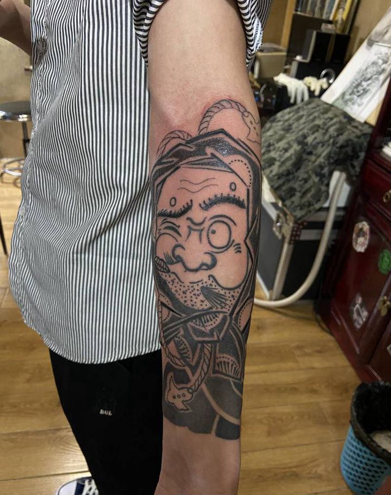 吹火男纹身图片_手臂老传统纹身图案