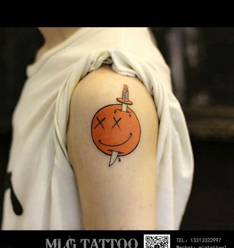 橙子纹身图片_手臂Old School纹身图案