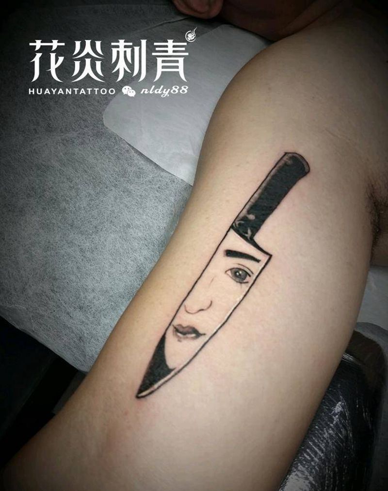 美女和刀纹身图片_手臂New School纹身图案